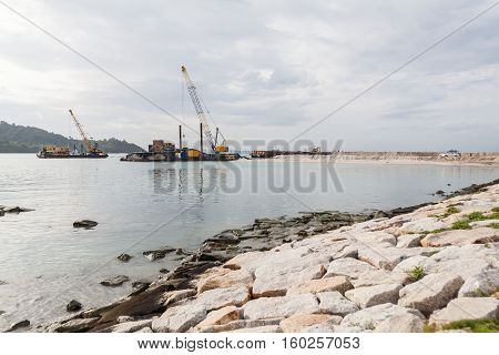 Sand replenishment ship on shore for land reclamation