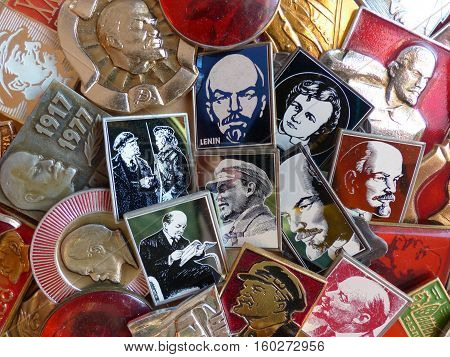 Yekaterinburg, Russia - December 6, 2016: Soviet badges depicting Vladimir Lenin. Collection. Close-up. Faleristics. Background