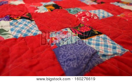 patchwork quilt in the village interior close up