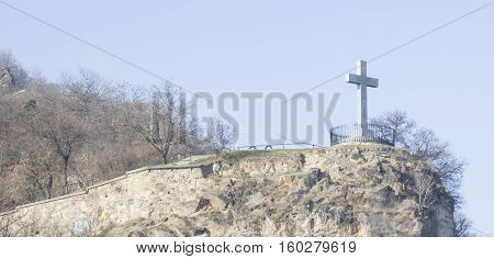 The cross of Jesus over the hill