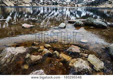 Small Pond in the Giant Mountains in the winter Poland