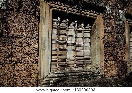 Window in a wall in ankor wat cambodia