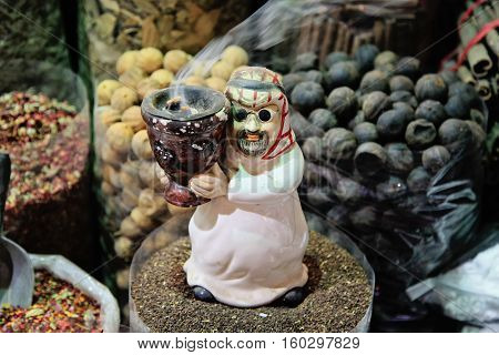 Closeup photo of bags filled with different kinds of spices spice souk Bur Dubai