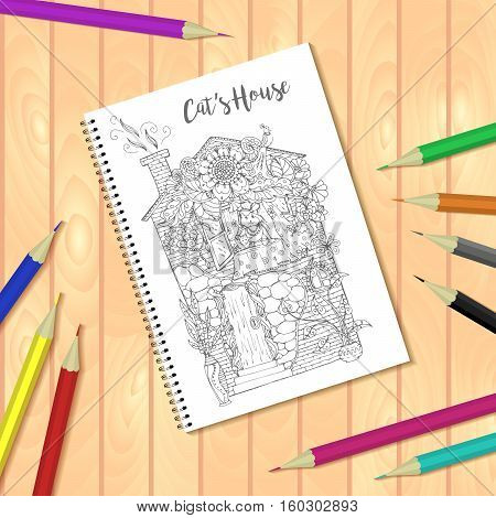 Spiral bound notepad or coloring book with colorful pencils and coloring pages picture, house with cat. Vector template or mock up. Easy to place your image on the cover.Top view.