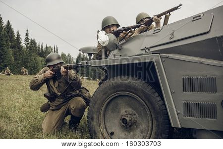 PERM RUSSIA - JULY 30 2016: Historical reenactment of World War II summer 1942. Soviet soldiers with rifles