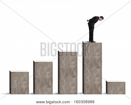 Businessman looking down the performance of statistical drastically