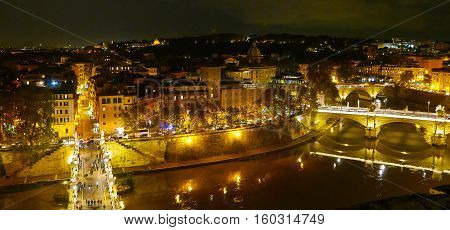 Great view over the city of Rome by night from Castel Sant Angelo