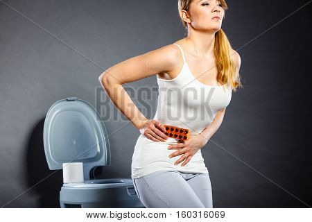 Woman Suffer From Belly Pain Holds Pills In Toilet