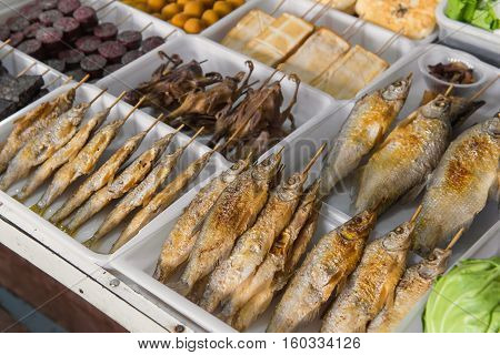Salted Grilled Fish On The Grill In Market