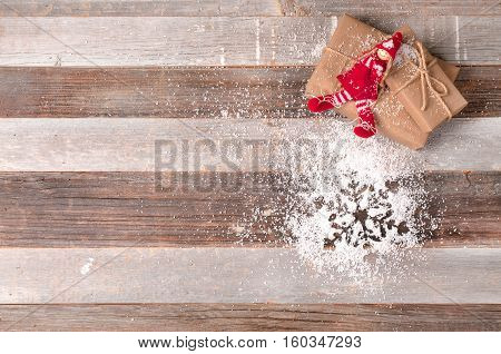 Christmas decoration and christmas gift on wooden background