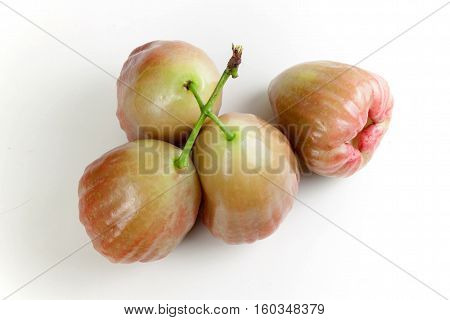 green rose apple (chomphu) on white background. Fruit heart shape.