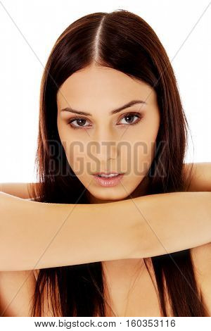 Close up portrait of beautiful young woman face. Isolated on white background.