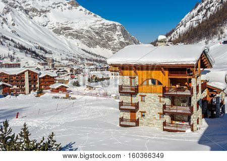 Alpine winter mountain landscape. French Alps covered with snow in sunny day. Val-d'Isere, France