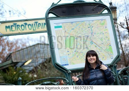 Beautiful Brunette Tourist In Paris Using Metro