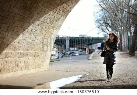 Beautiful Brunette Tourist Walking At The Emankment In Paris