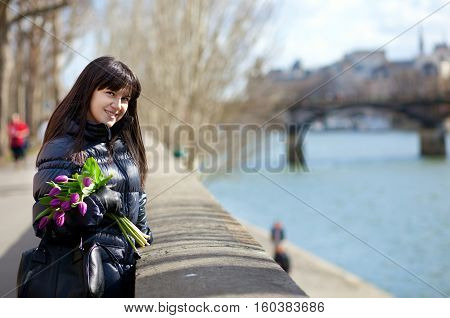 Cheerful Young Lady In Paris With Beautiful Bunch Of Flowers