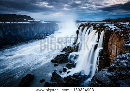 Rapid flow of water powerful Selfoss cascade. Unusual and gorgeous scene. Popular tourist attraction. Location famous place Vatnajokull National Park, Jokulsa a Fjollum, Iceland, Europe. Beauty world.