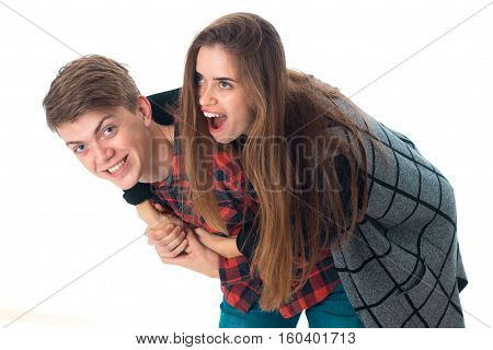 portrait of cheetful stylish couple in love having fun in studio isolated on white background