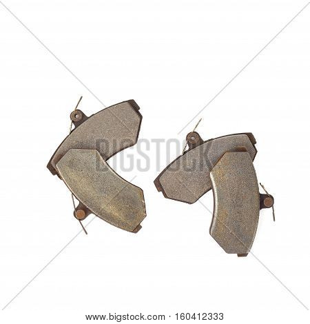Old brake pads disk brake isolated on a white background