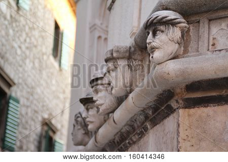 Sibenik cathedral / Famous faces on the side protal of Sibenik cathedral.