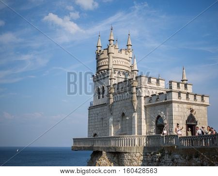 Gaspra, Crimea, Russia - September 2016: The decorative Neo-Gothic castle Swallow's Nest on the rock over the Black Sea.