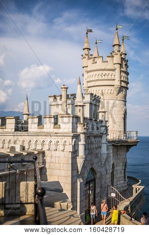 Gaspra, Crimea, Russia - September 2016: The decorative Neo-Gothic castle Swallow's Nest on the rock over the Black Sea.