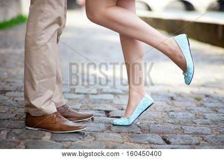 Male And Female Legs During A Date