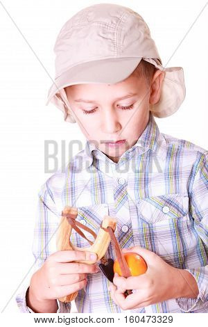 Young Boy Use Sling Shot Shoot Mandarine.