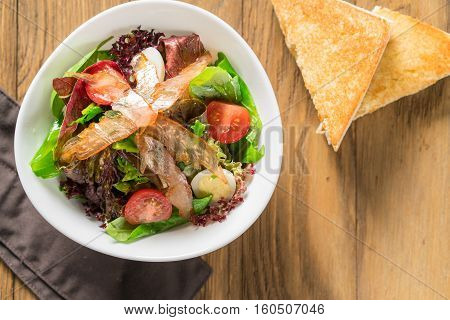 Fresh Breakfast Omelette Salad With Parma Ham, Feta Cheese And Vegetables.