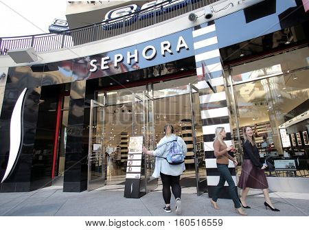 HOLLYWOOD - WEDNESDAY, NOVEMBER 16, 2016: Shoppers enter a Sephora store. Sephora is a French chain of cosmetics stores.