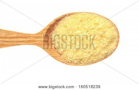 Wooden spoon with cornmeal isolated on white