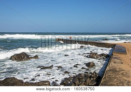 Curved Concrete Pier At Rocky Umkomaas Beach