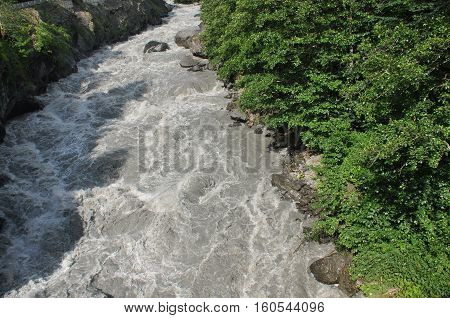 Inguri River. Georgia. Strong current and high level in the river.