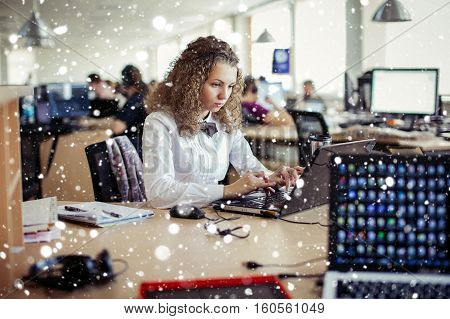 business office winter christmas people concept- Young pretty business woman with notebook in the office over snow background