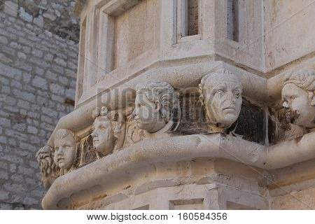Sibenik cathedral / Famous faces on the side protal of Sibenik cathedral.
