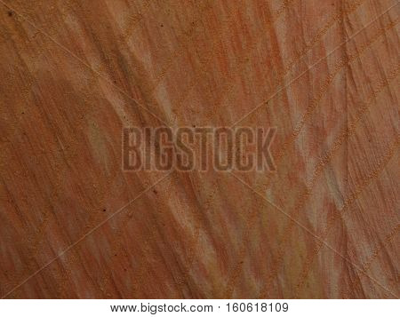 Red wood, freshly cut with chainsaw, abstract background