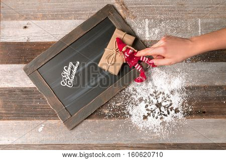 Christmas decoration and gift with chalk blackboard for greeting Merry Christmas