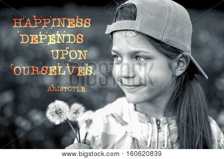 happiness depends upon ourselves - ancient Greek philosopher Aristotle quote printed on image of happy girl with dandelions