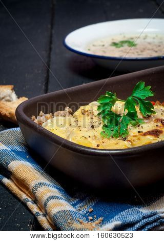 Homemade Moussaka served with bread and chutney (East European cuisine)