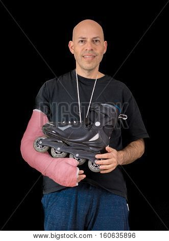 Young Man Wearing An Arm Cast After A Skating Accident