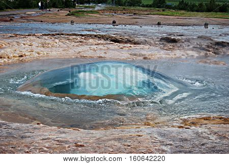 Famous geyser of Strokkur. Bubble about to explode. Iceland