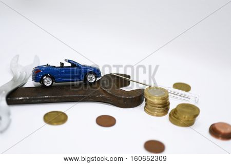 Abstract composition of broken car and repair process.
