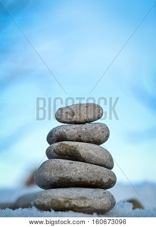 zen spa stones with blue sky in nature