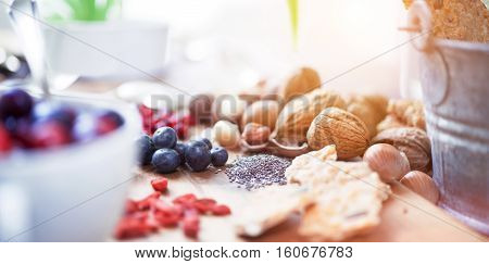 Superfood: variation of superfoods on wooden background