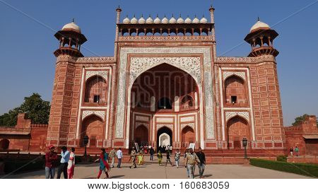 Agra, India - Nov 27, 2016: Many Visitors Walk Around Outside The Entrance Of Taj Mahal The Monument