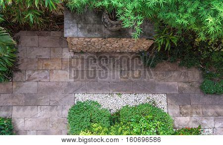 Natural flagstone path landscaping in home garden. Top view