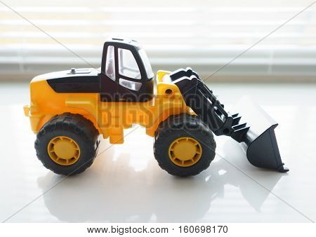 Toy Industrial Vehicle, Plastic Wheel Loader Excavator for Earth Moving Works at Construction Site, Miniature Earth Mover, Backhoe Loader, Frontend Loader with a Big Scoop, Heavy-duty Bulldozer