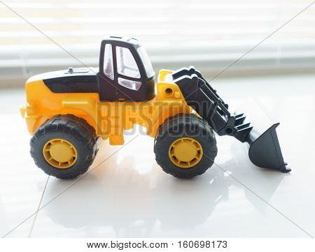 Toy Industrial Vehicle, Plastic Wheel Loader Excavator for Earth Moving Works at Construction Site, Miniature Earth Mover, Backhoe Loader, Frontend Loader with a Big Scoop, Heavy-duty Bulldozer