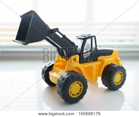 Toy Industrial Vehicle, Plastic Wheel Loader Excavator for Earth Moving Works at Construction Site, Miniature Earth Mover, Backhoe Loader, Frontend Loader with a Big Scoop, Heavy-duty Bulldozer