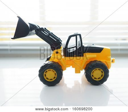 Toy Industrial Vehicle, Plastic Wheel Loader Excavator for Earth Moving Works at Construction Site, Miniature Earth Mover, Backhoe Loader, Frontend Loader with a Big Scoop, Heavy-duty Bulldozer